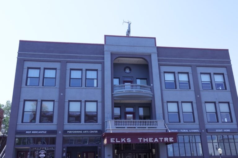 Elks Theatre building with its marquee and elk statue on the roof on Gurley Street in downtown Prescott, Arizona