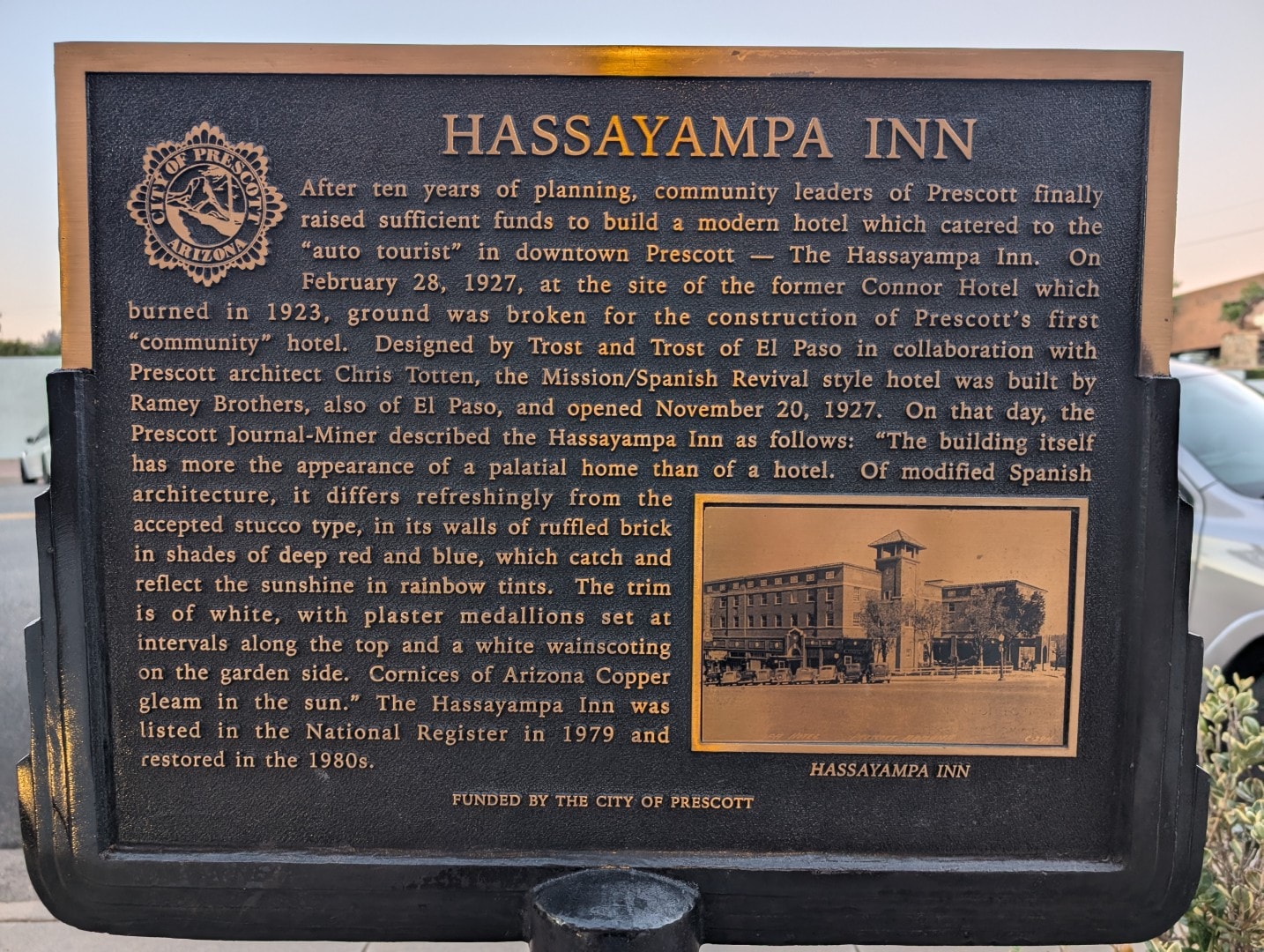 City of Prescott historical plaque for the Hassayampa Inn describing its 1927 opening, with a vintage photo of the hotel