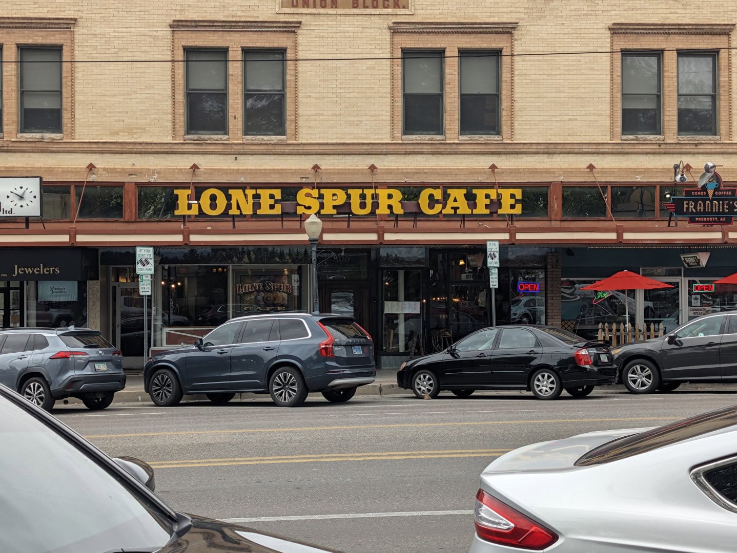 Old Lone Spur Cafe sign above the Gurley Street storefront in the historic Union Block in downtown Prescott, Arizona, now home to Cowboy Kitchen